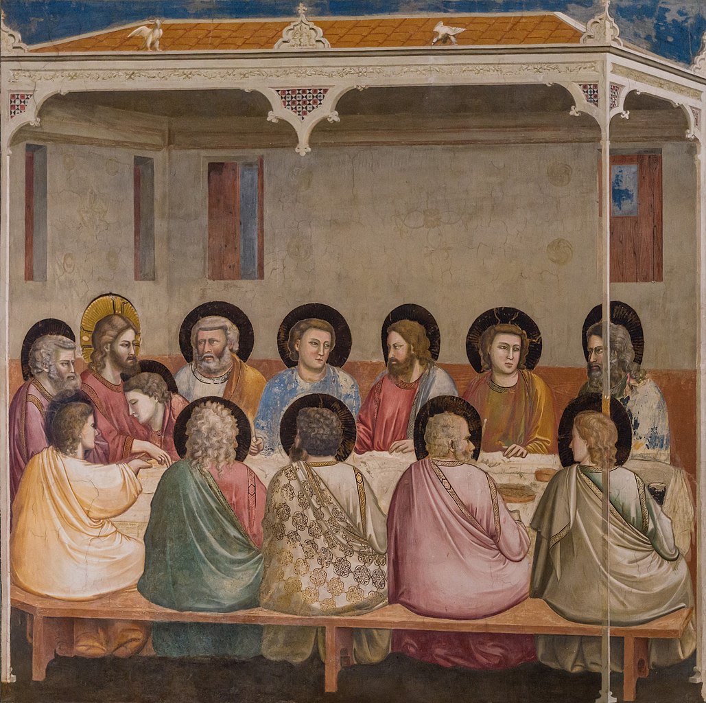 Kuvassa Jeesus ja kaksitoista oppilasta huoneessa pöydän ääressä.